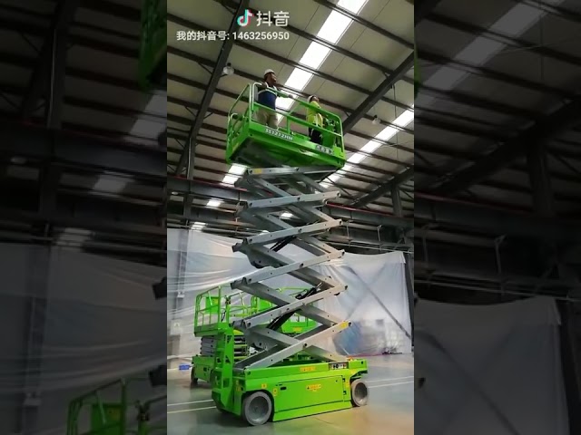 Portable 13m electric scissor lift 320kg capacity elevated work platform for sale